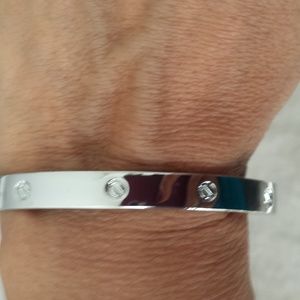 Beautiful stainless steel silver love bracelet.